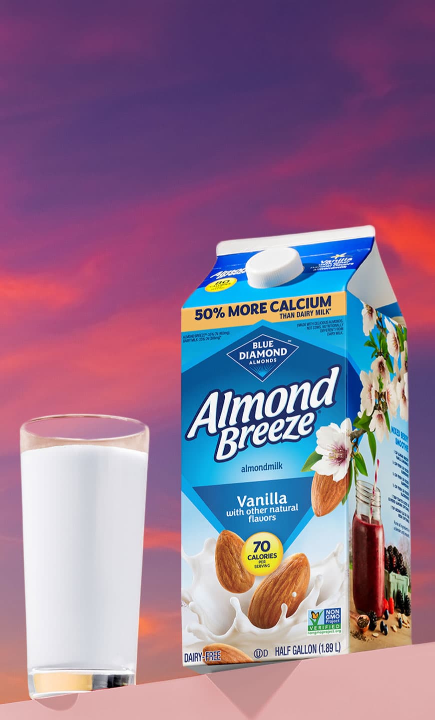 Almond breeze carton next to glass