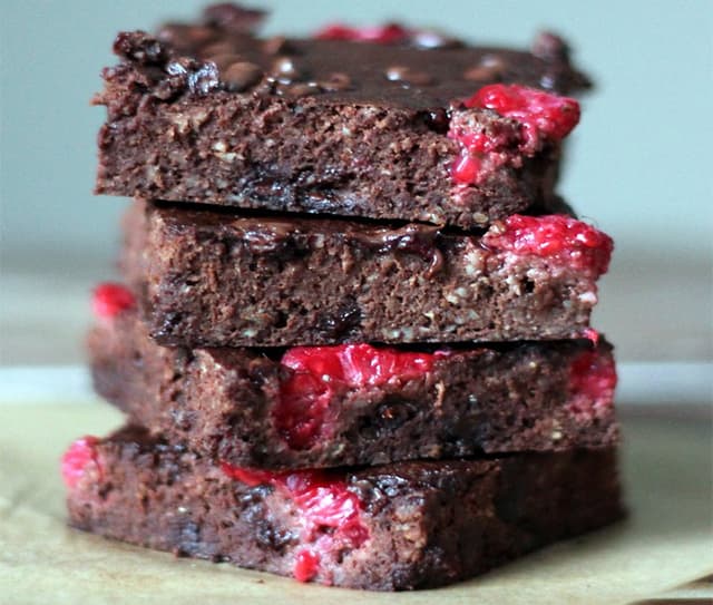 Stack of raspberry chocolate chip protein brownies