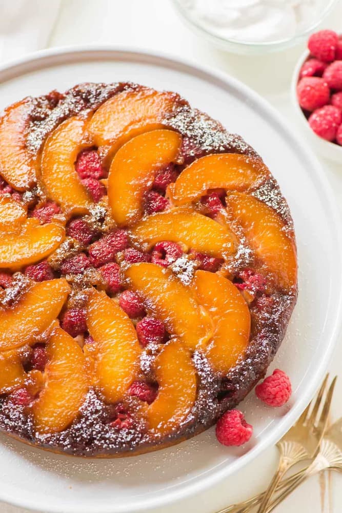 Peach upside down cake topped with fresh peaches