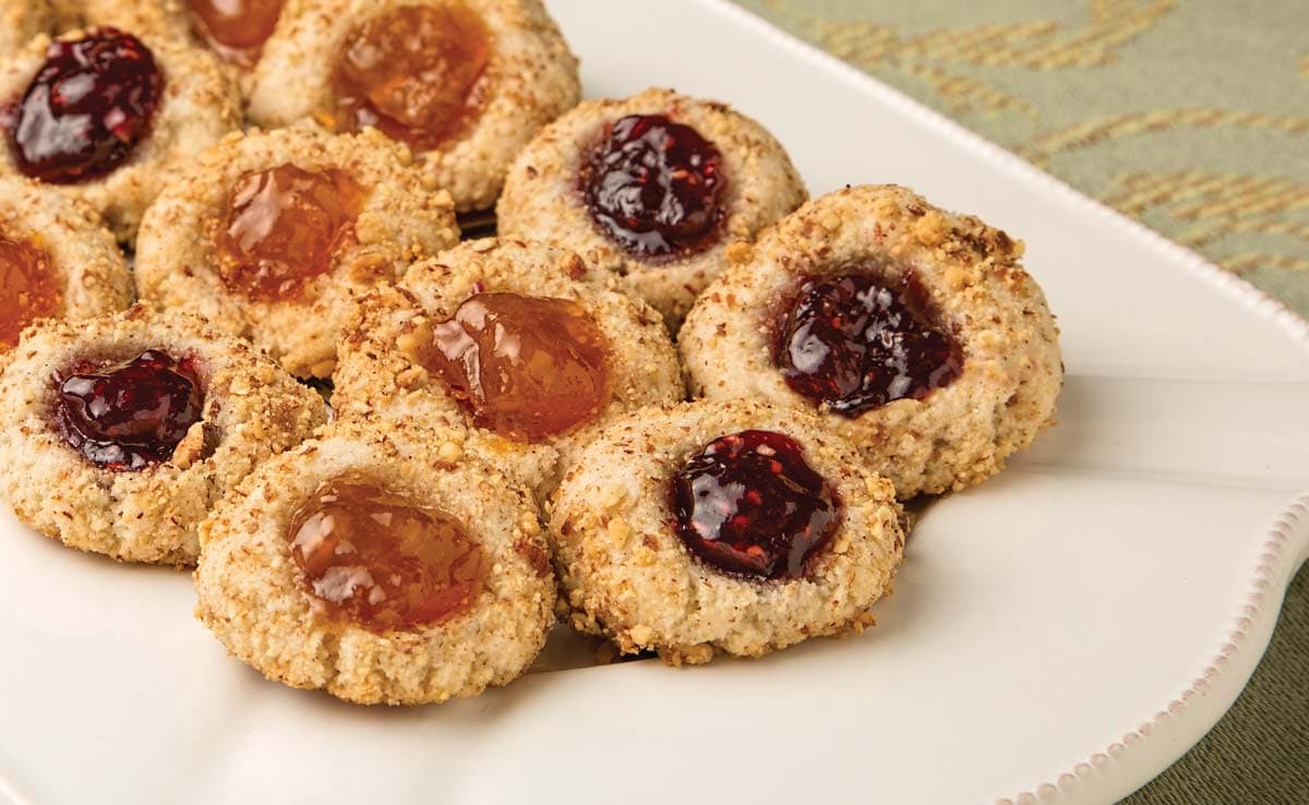 Platter full of gluten-free almond thumbprint cookies made with Blue Diamond Almond Flour