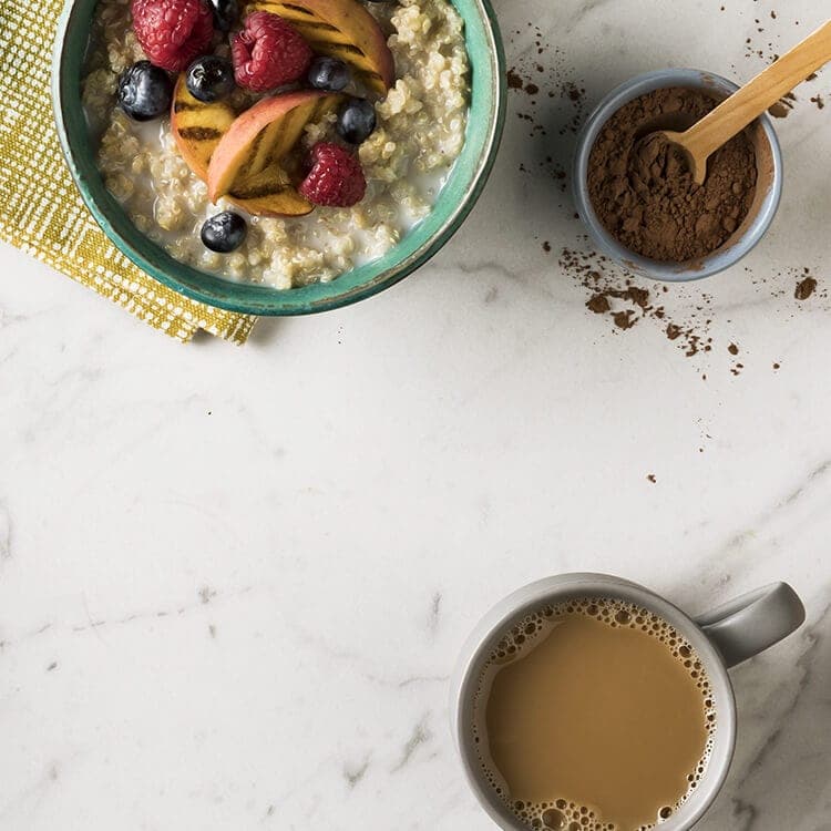 Counter top with bowl of oatmeal and mug of coffee