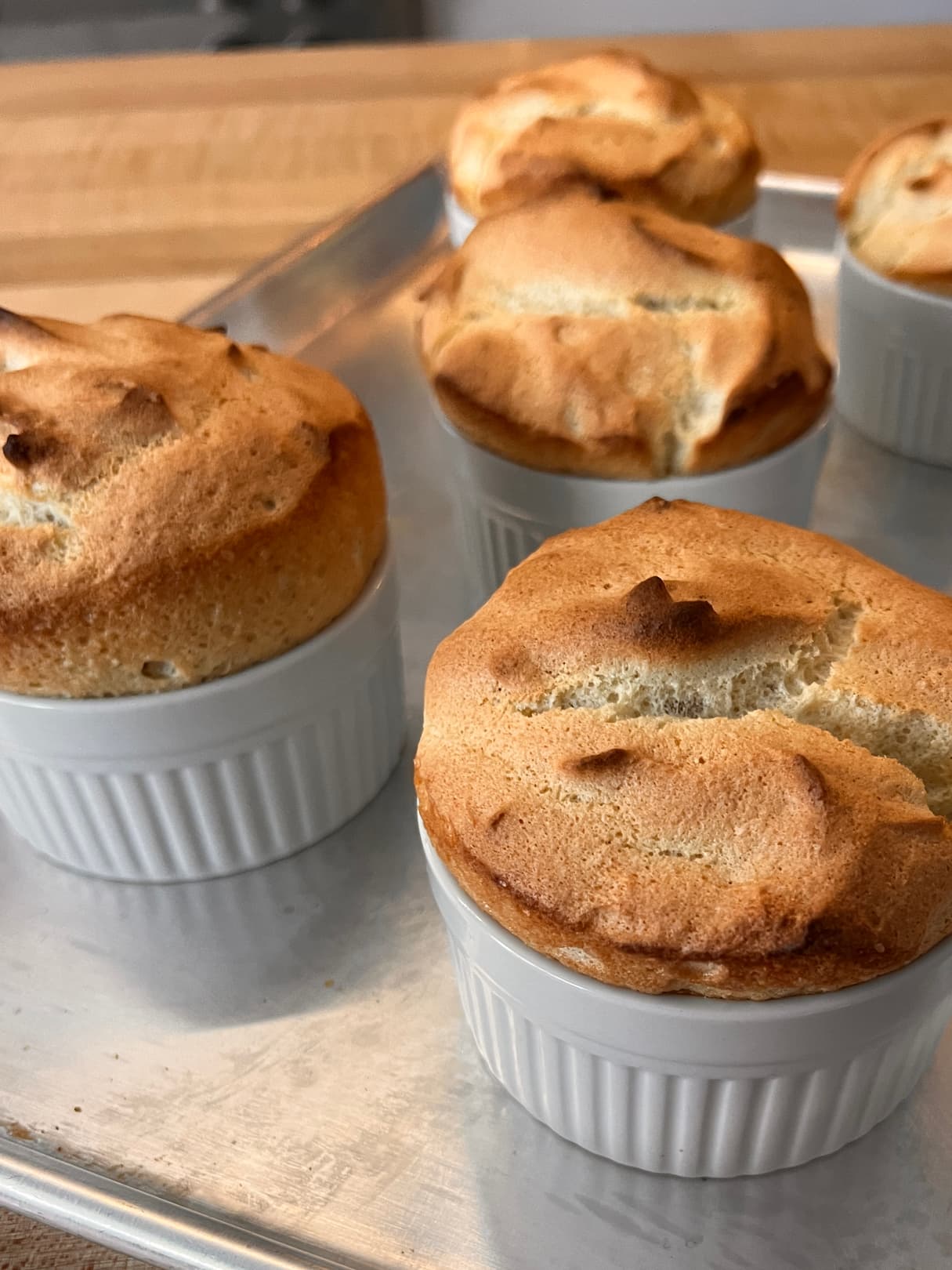 Baking tray with multiple gluten-free almond souffles made with Blue Diamond Almond Flour