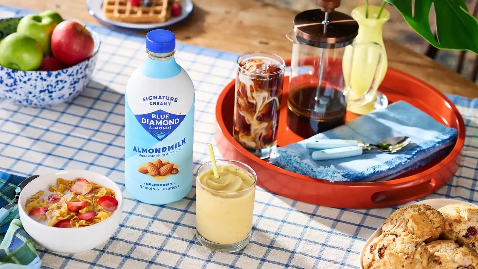 Bluediamond Signature Almondmilk on table surrounded by other foods